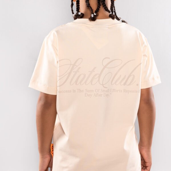 Conjunto para niño beige estampado espalda