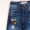 Jeans-denim-urbano-nino-azul-oscuro-2 parches bordados en jean azul oscuro para niño