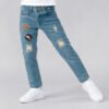 jeans azul verdoso con parches y rotos para niño, con cortes slim, en Impacto Urban