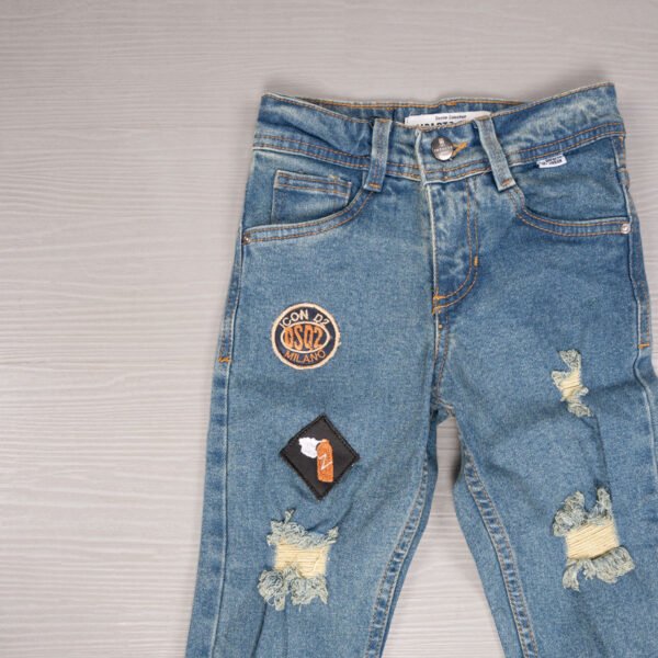 jeans azul verdoso con parches para niño, en Impacto urban